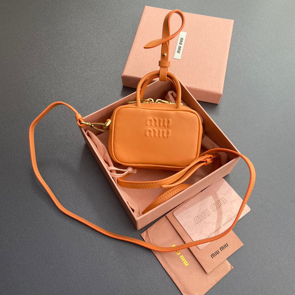 MICRO BAG KEYCHAIN 11 IN HOT CINNAMON ORANGE CALFSKIN EMBOSSED LOGO